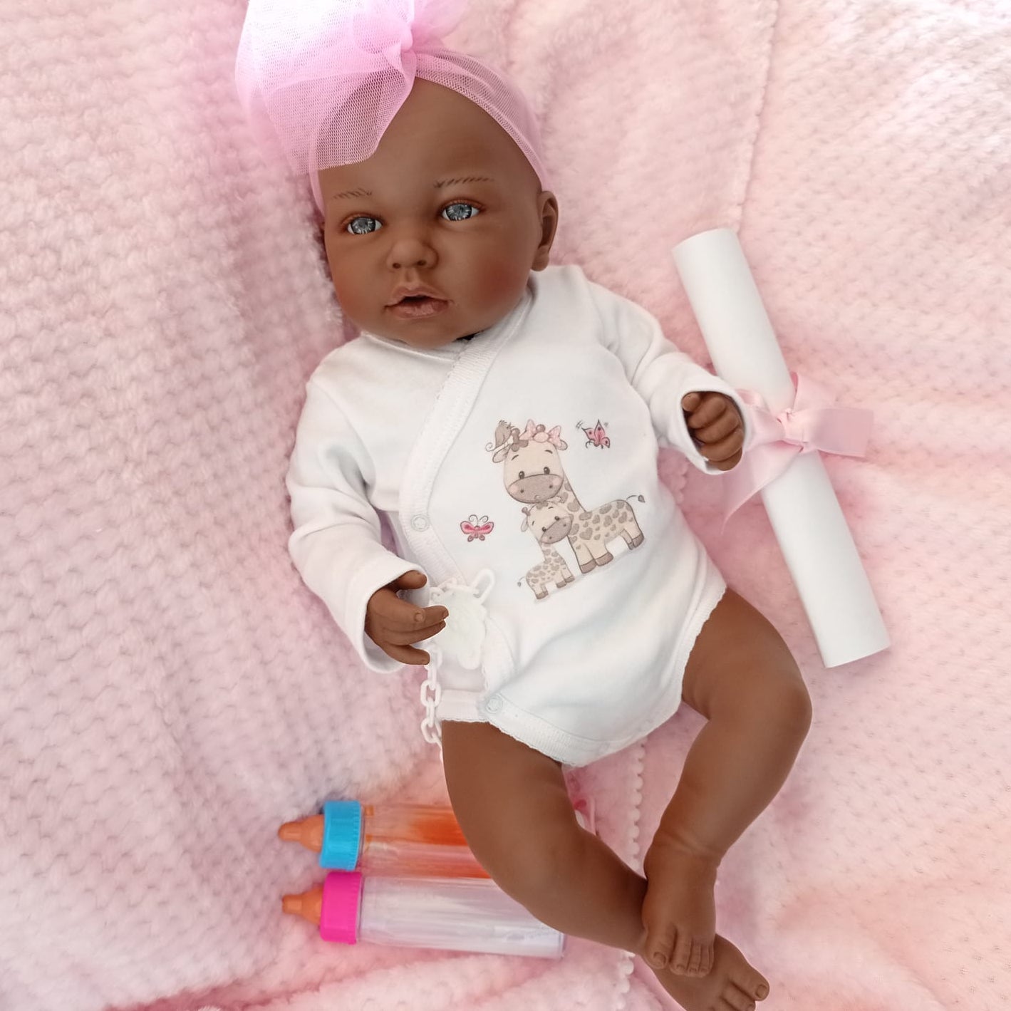Reborn Baby Doll Reborn Africa - 48CM e 2KG - VINILE e EFFETTO CADUTA TESTA